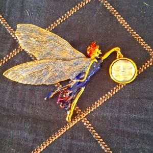 A two and a half to 3 in fairy brooch